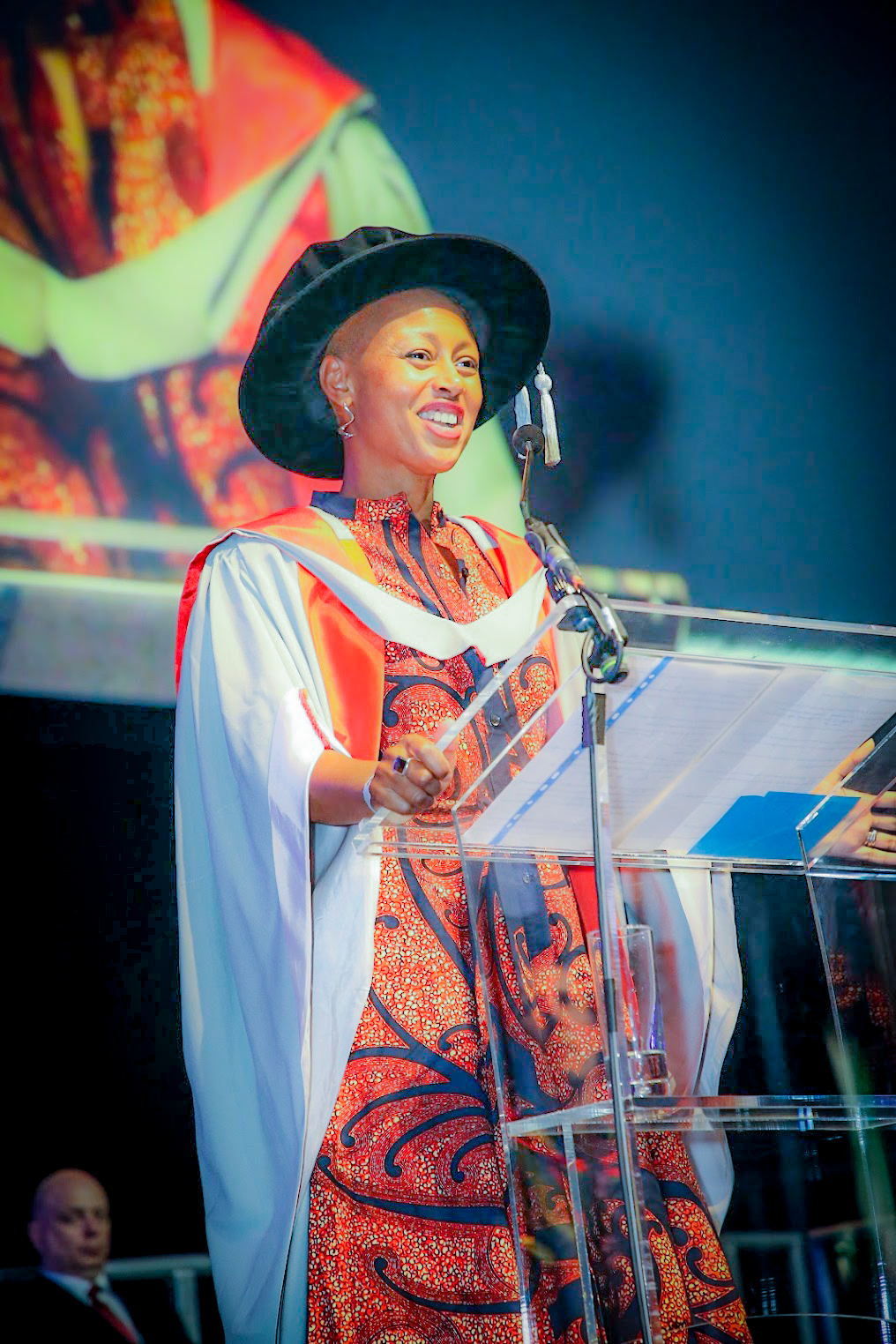 Leanne Case at the UCL Graduation podium